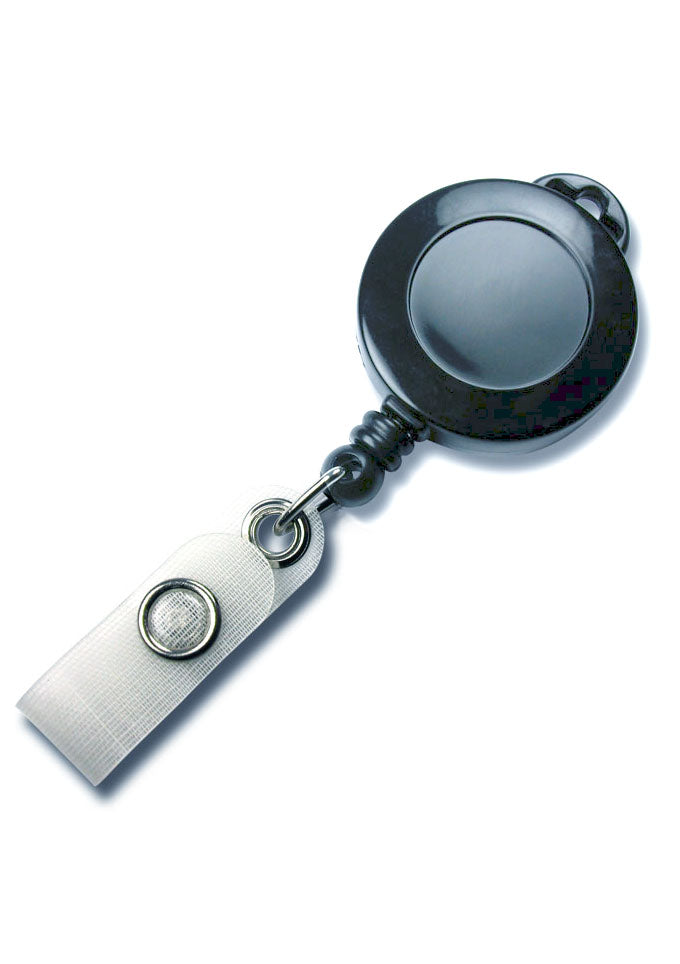 Lanyard-Jojo  Runder Lanyard–Jojo aus Kunststoff, mit 10 mm breitem Bandschlitz. Mit textilverstärkter Lasche. Durchmesser: Ø 32 mm Druckfläche: Ø 20 mm Mögliche Farben: schwarz, weiß, grau, blau, grün, gelb, orange, rot